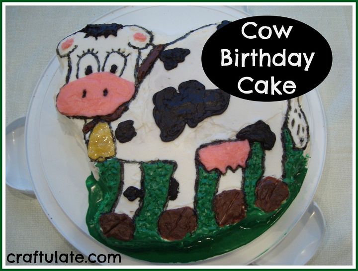 Cow themed 1st birthday two tiered Cake