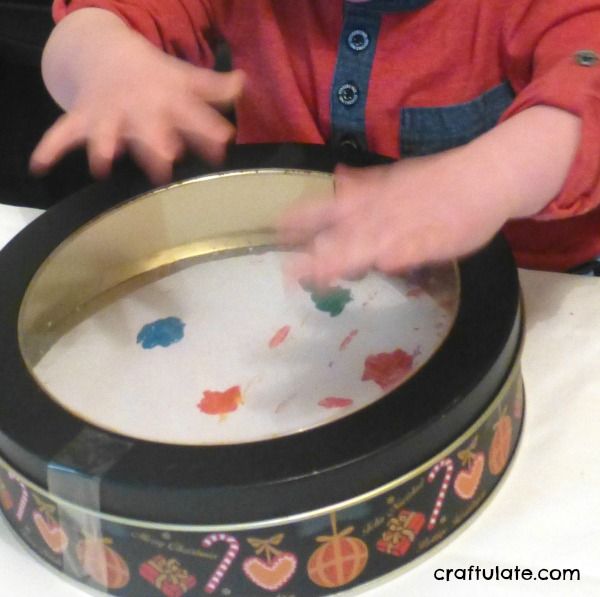 Marble Painting in a Cake Tin - mess free process art activity for toddlers