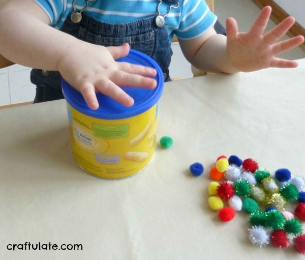 Pom Pom Drop for fine motor practice for toddlers