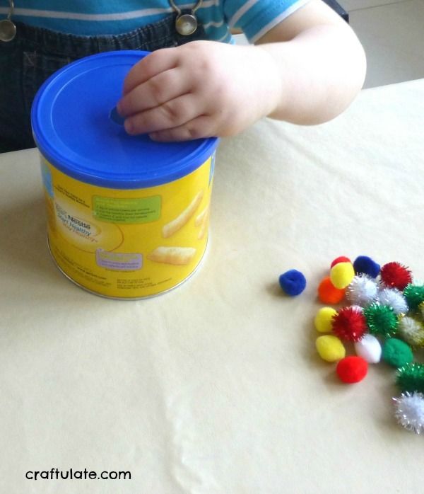 Pom Pom Drop for fine motor practice for toddlers