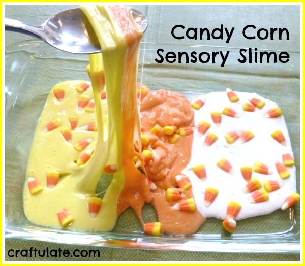 Candy Corn Sensory Slime - decorated with leftover candy corn!