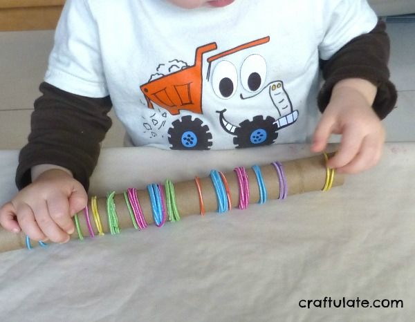 Cardboard Tube and Elastic Hair Bands - fine motor skills practice