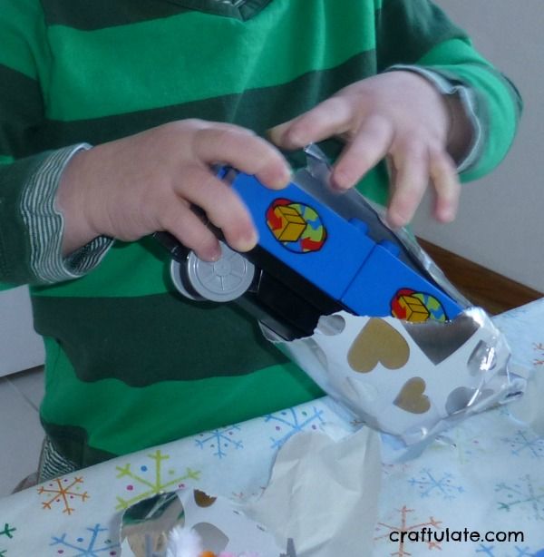 Train-Themed Unwrapping - fine motor activity