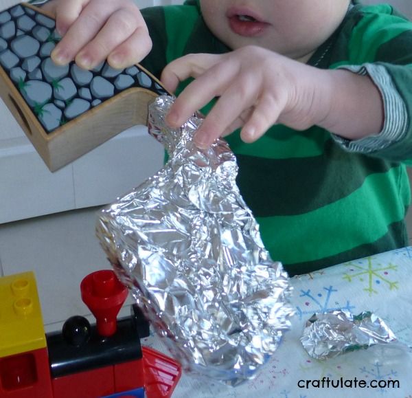 Train-Themed Unwrapping - fine motor activity