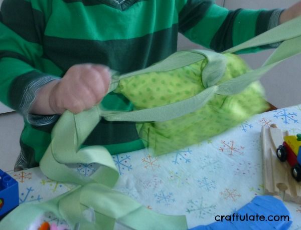 Train-Themed Unwrapping - fine motor activity