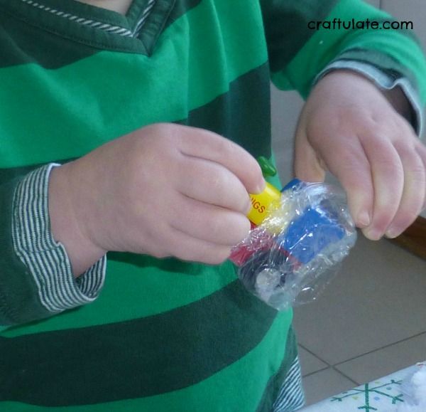 Train-Themed Unwrapping - fine motor activity