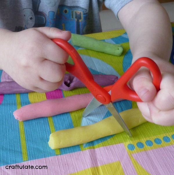 Learning To Use Scissors - an essential fine motor skill for little kids