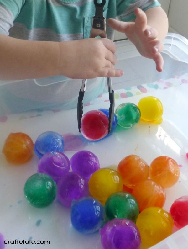Rainbow Ice Ball Sensory Bin - icy colorful fun!