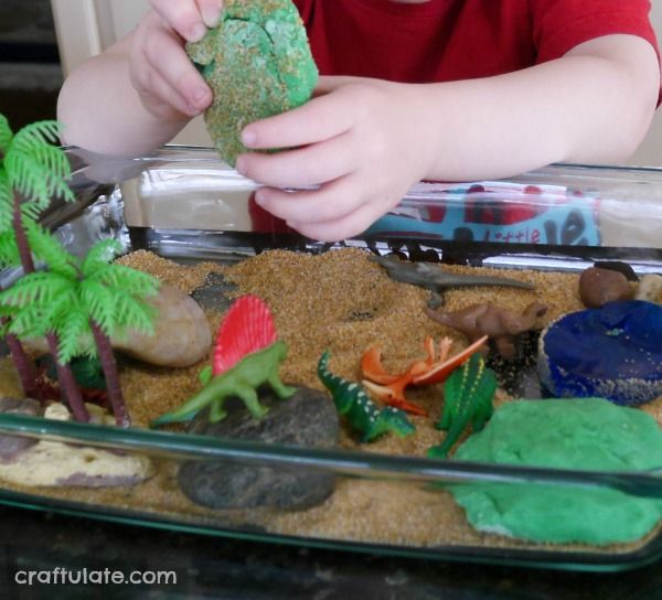 Dinosaur Small World for sensory play from Craftulate