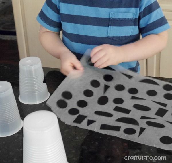 Light-Up Plastic Cup Ghosts - a fun Halloween craft for kids