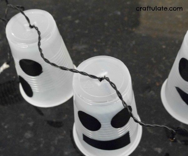 Light-Up Plastic Cup Ghosts - a fun Halloween craft for kids