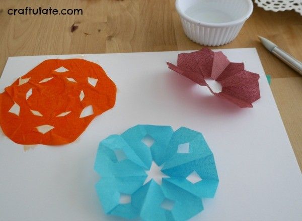 Tissue Paper Snowflake Art - a fun winter activity for kids!