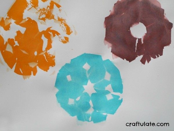 Tissue Paper Snowflake Art - a fun winter activity for kids!