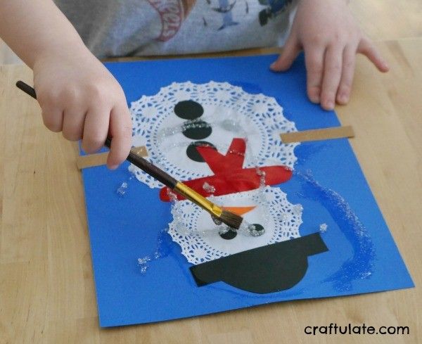 Doily Snowmen Craft - a fun winter activity for kids