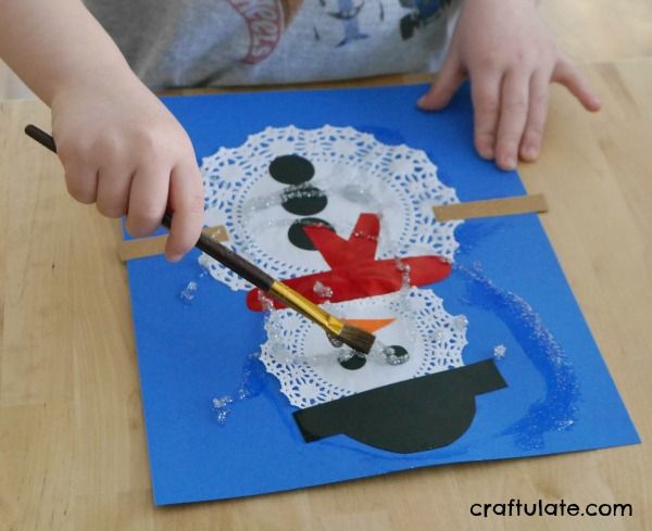 Doily Snowmen Craft - a fun winter activity for kids
