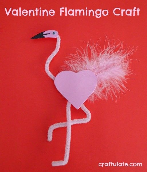 pink flamingos making a heart