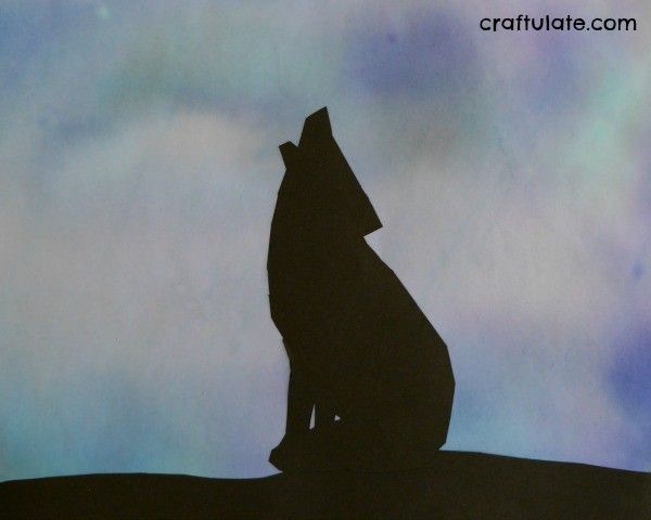 Wolf Art for Kids - silhouette wolf with a background made from markers and water!