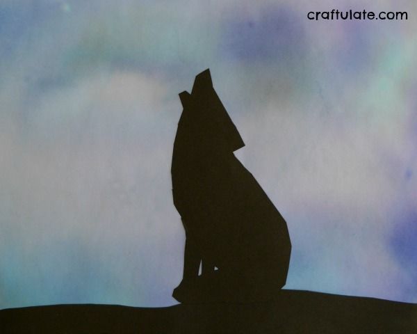 Wolf Art for Kids - silhouette wolf with a background made from markers and water!