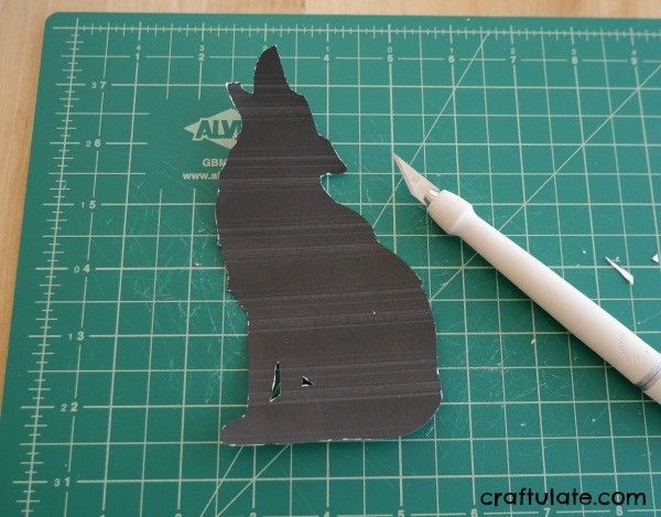 Wolf Art for Kids - silhouette wolf with a background made from markers and water!