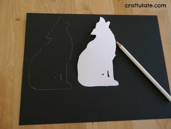 Wolf Art for Kids - silhouette wolf with a background made from markers and water!