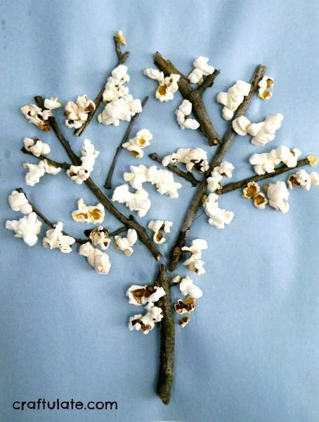 Popcorn Trees - a fun kids craft to make with sticks and leftover popcorn!