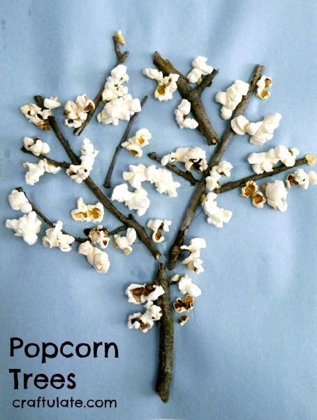 Popcorn Trees - a fun kids craft to make with sticks and leftover popcorn!