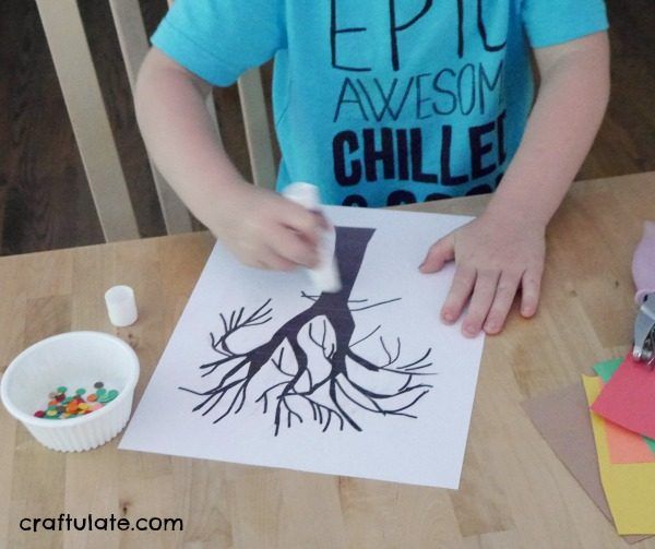 Punched Paper Tree Collage - a fall art activity for kids