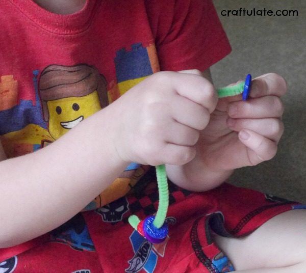 Fine Motor Button Snake - a cute activity for kids that works on fine motor skills