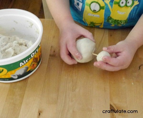 Clay Turkey Craft for Kids - use air dry clay, feathers and paint to make this cute turkey!