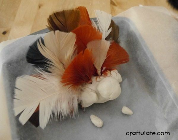 Clay Turkey Craft for Kids - use air dry clay, feathers and paint to make this cute turkey!