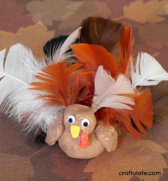 Clay Turkey Craft for Kids - use air dry clay, feathers and paint to make this cute turkey!