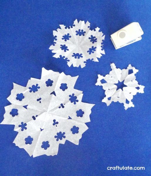 Paper Punch Snowflakes - a winter craft for kids to make