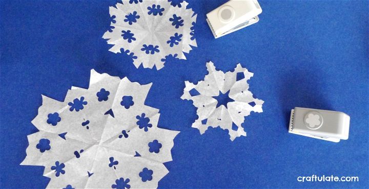 Paper Snowflakes with Hole Punch Stock Image - Image of concepts, paper:  36871729