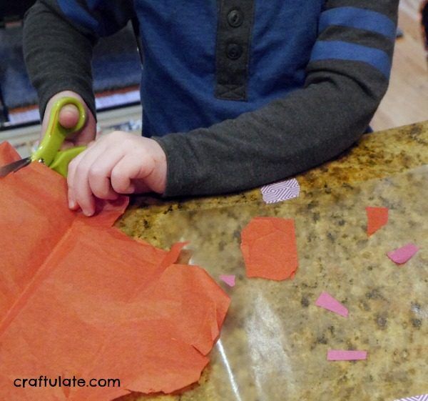 Paper Plate Heart Suncatcher - a fun crafts for kids of all ages for Valentine's Day!