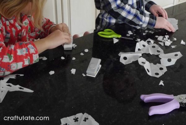 Paper Punch Snowflakes - a winter craft for kids to make