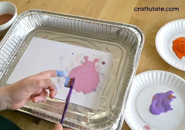 Toothbrush Splatter Painting - a fun way for kids to make art!