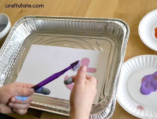 Toothbrush Splatter Painting - a fun way for kids to make art!