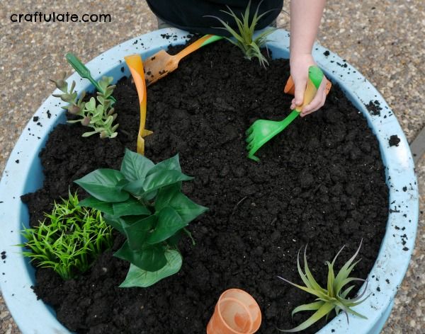 Gardening Sensory Bin - a fun activity for kids to explore and discover!